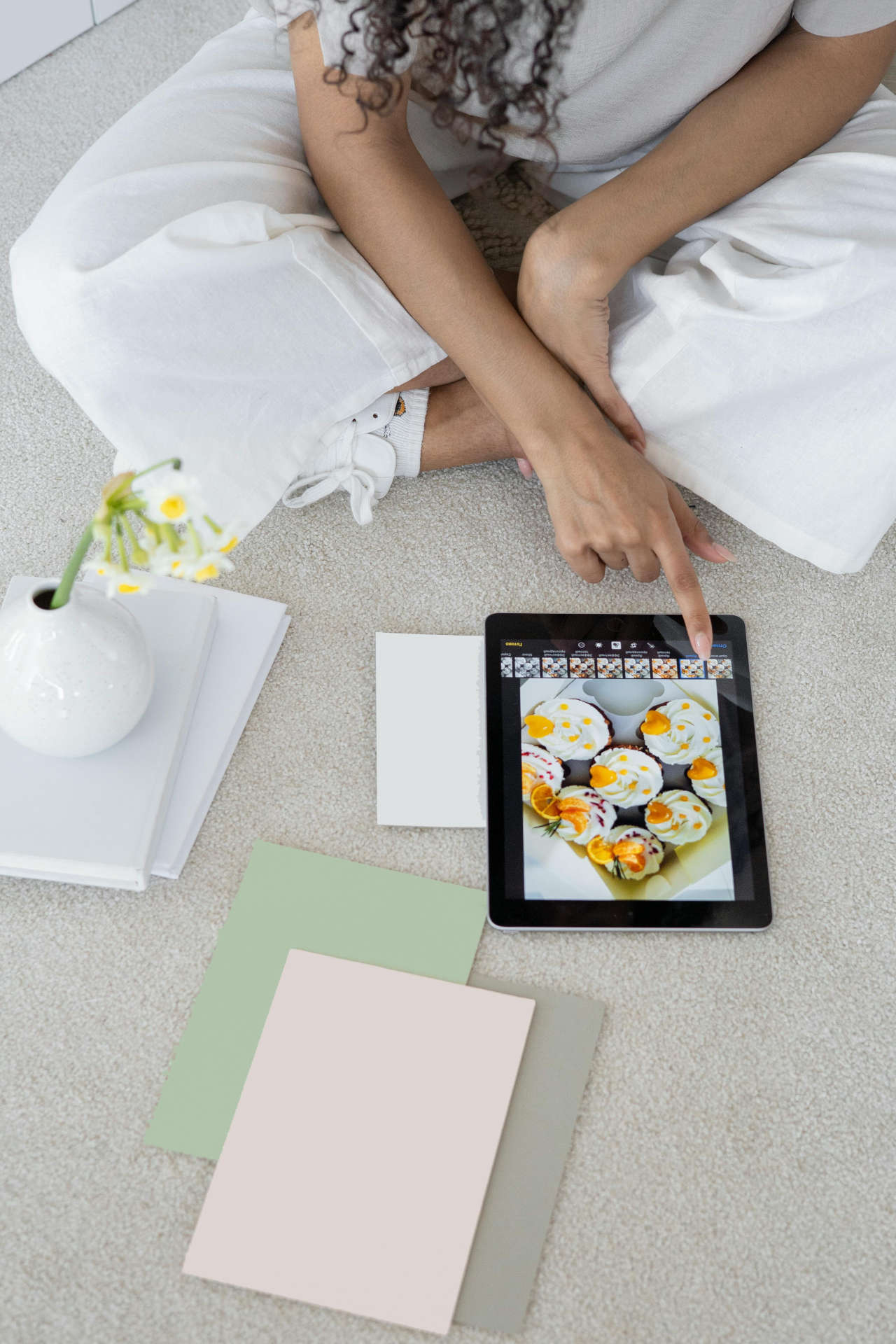 Woman sitting with iPad