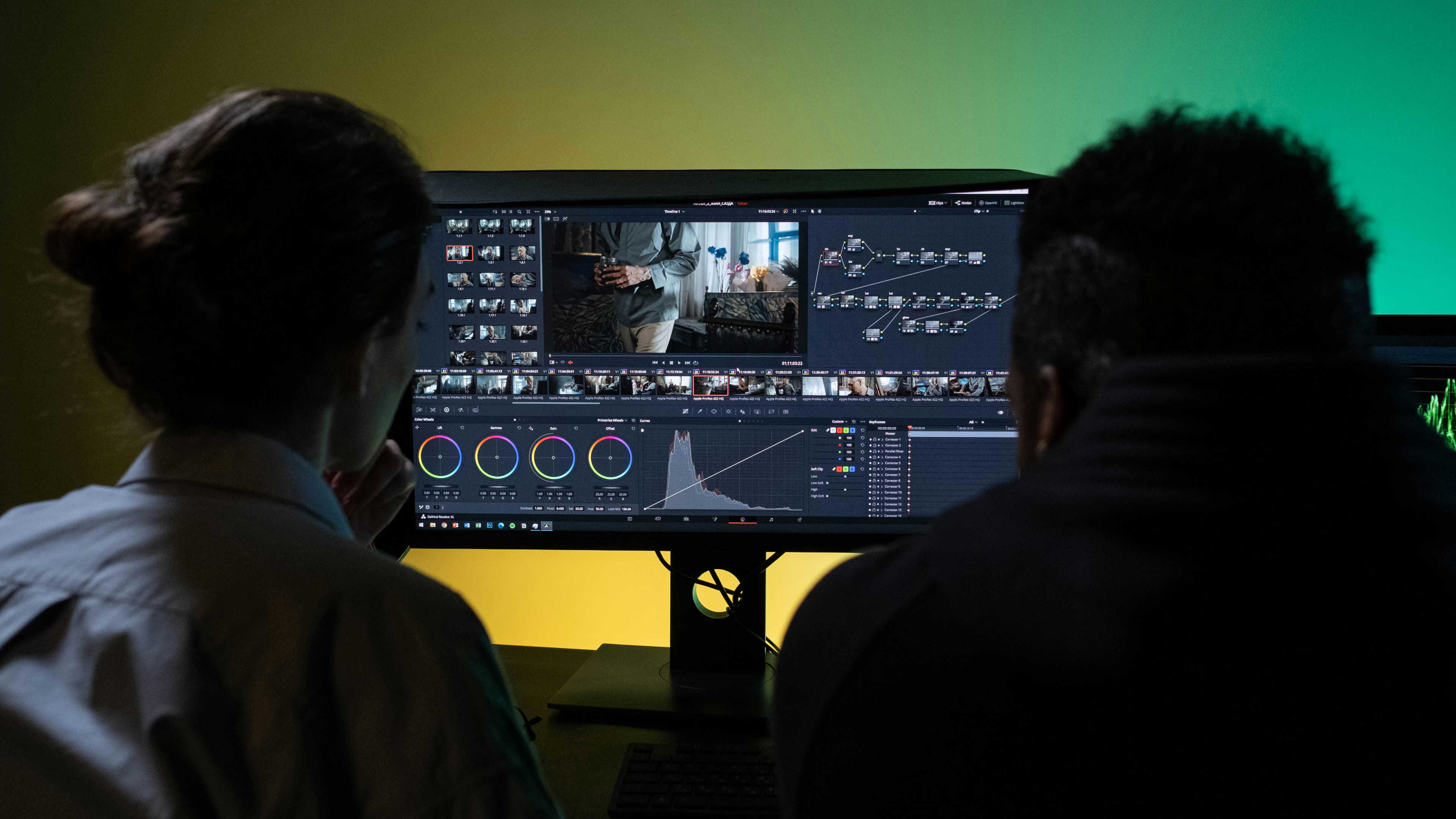 Screenshot of DaVinci Resolve's Color page, showcasing color parameters and node-based visual effects