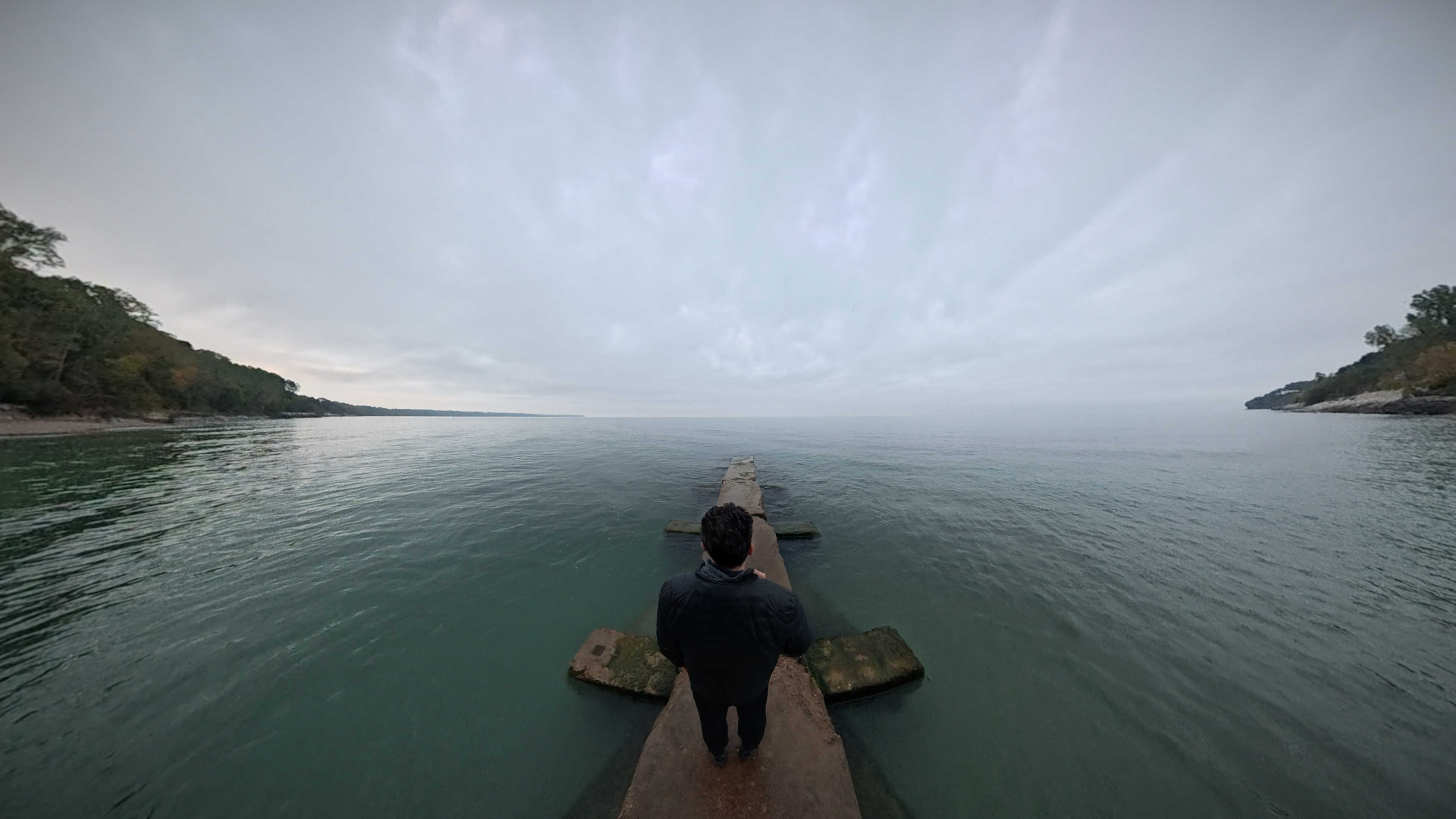 Standing on the pier at Big Bay Park overlooking Lake Michigan