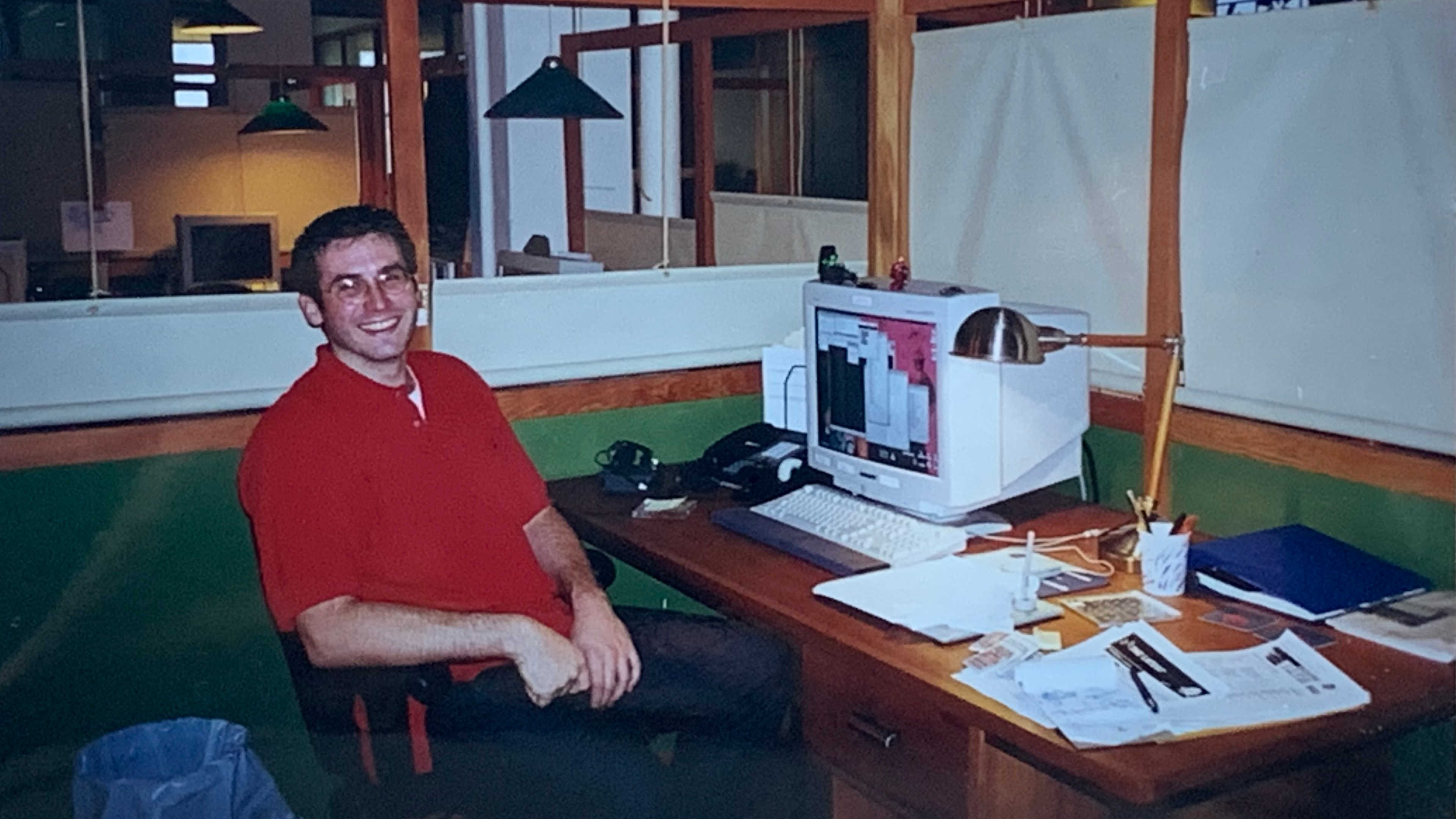 Sitting at a desk in front of a computer