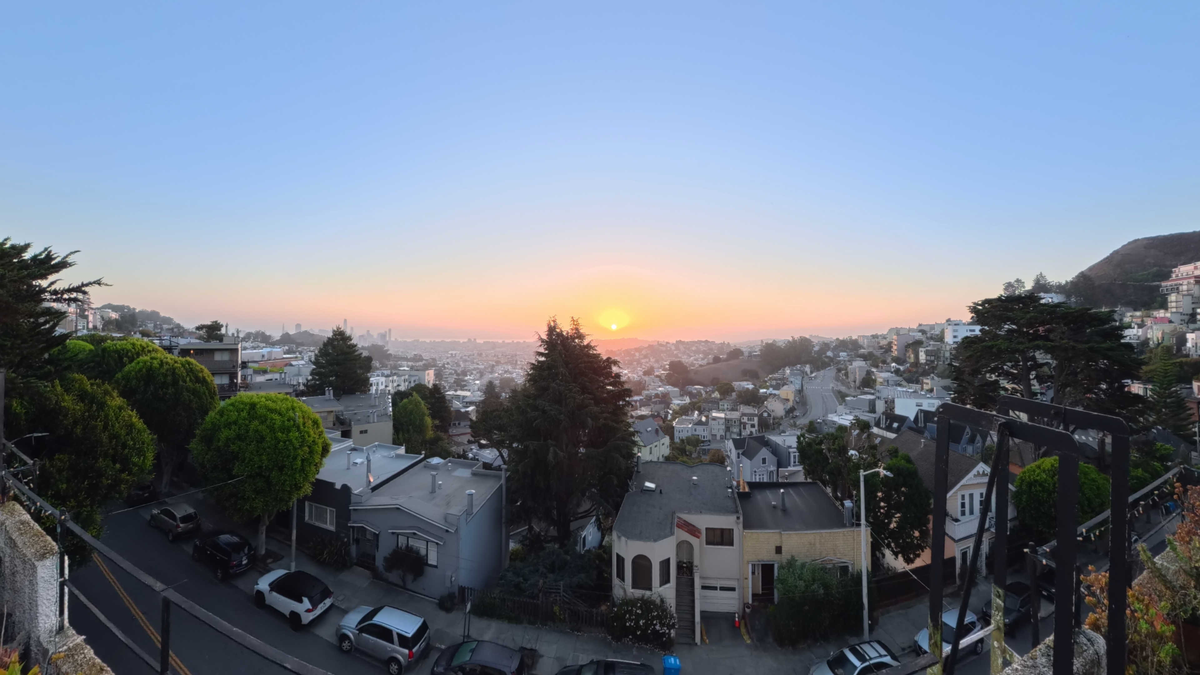 Sitting at a desk in front of a computer