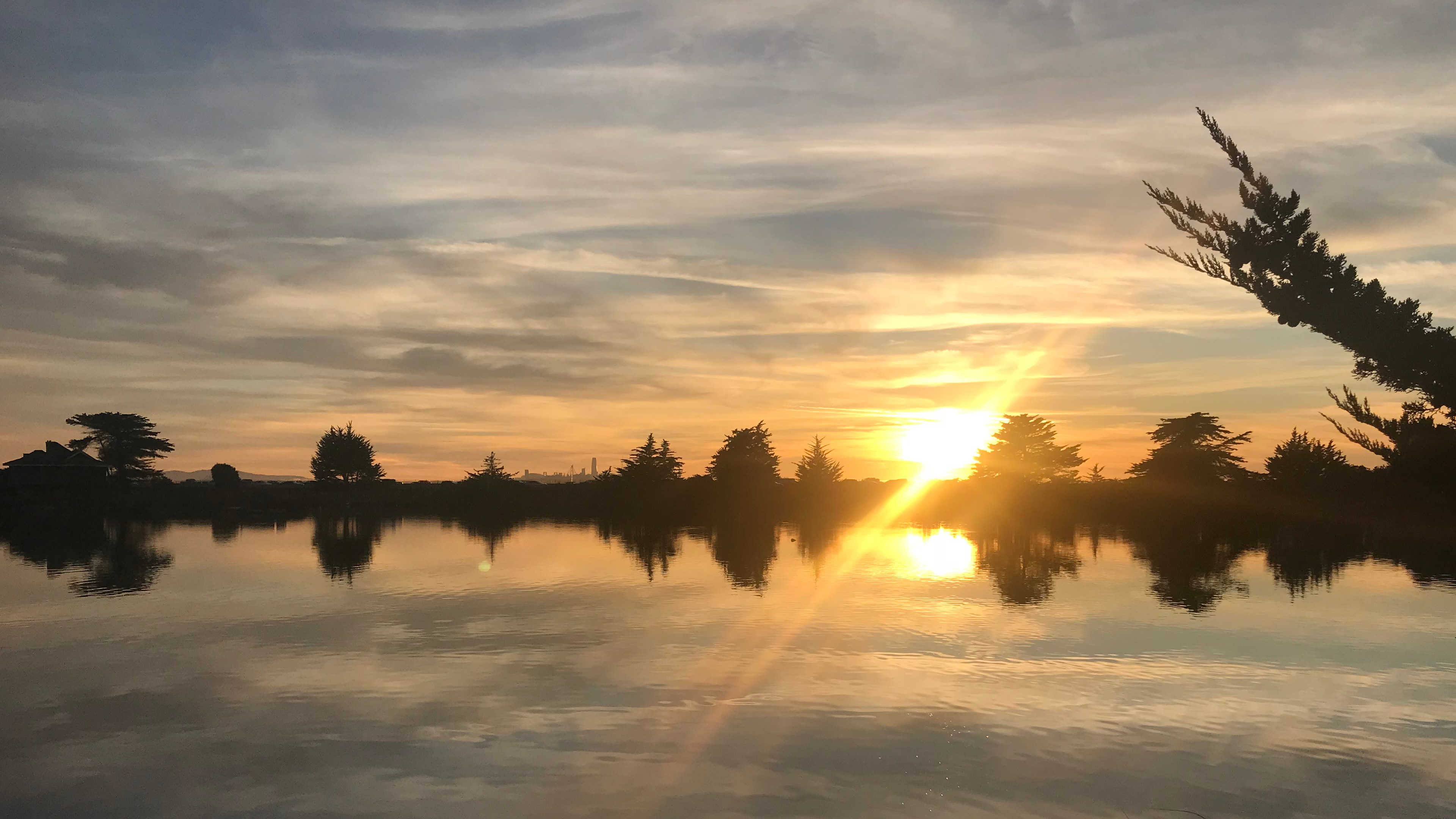 Sunset over a lagoon reflecting in the water